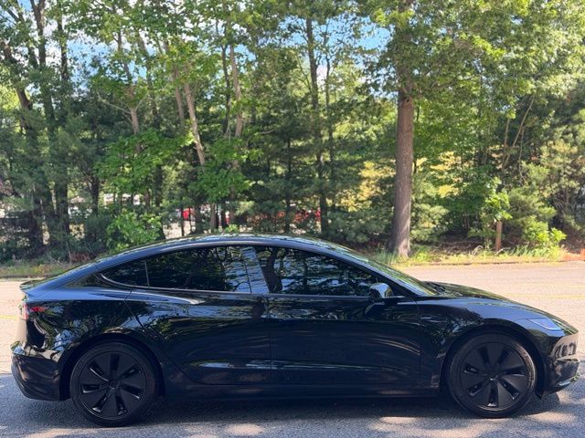 2024 Tesla Model 3 view 4